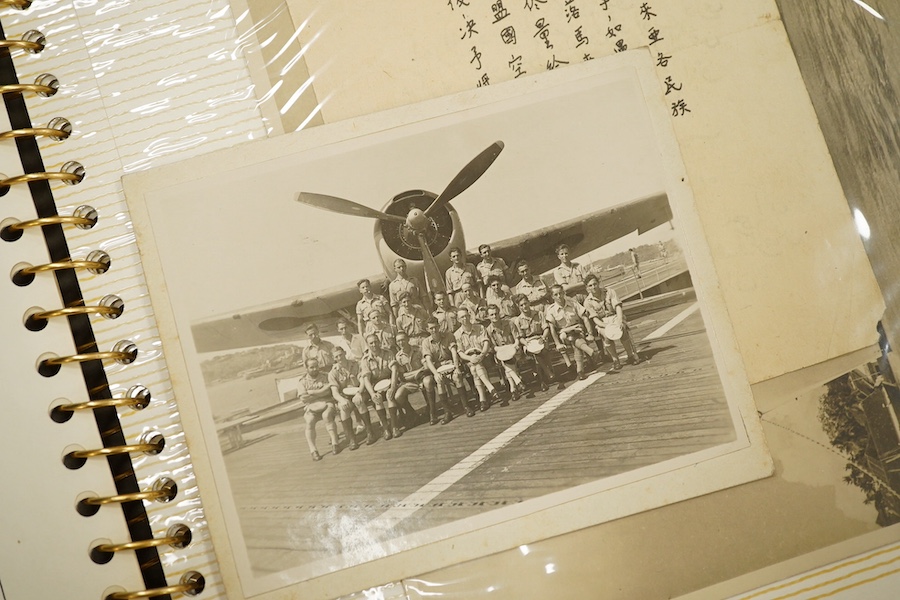 Two photograph albums containing an archive of WWII photos mainly of the RAF in Japan and the Far East, including a number of photos of RAF aircraft, aircraft carriers, Royal Naval ships, photographs of crew, military so